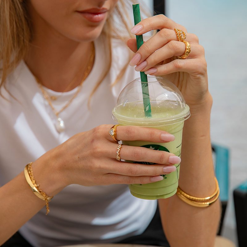"Mikami" 18 carat gold plated ring with white stones