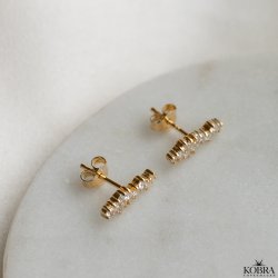 "Mikami" gold ear studs in a unique design