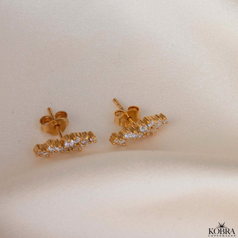 "Mikami" gold ear studs in a unique design