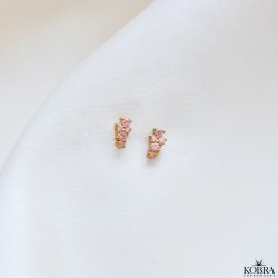 "Mikami" gold mini earrings in a unique design with pink stones