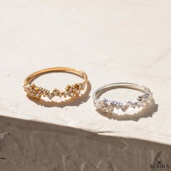 "Mikami" 18 carat gold plated ring with white stones