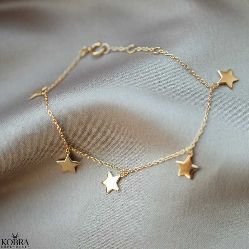 "Mina" bracelet with star pendants in gold
