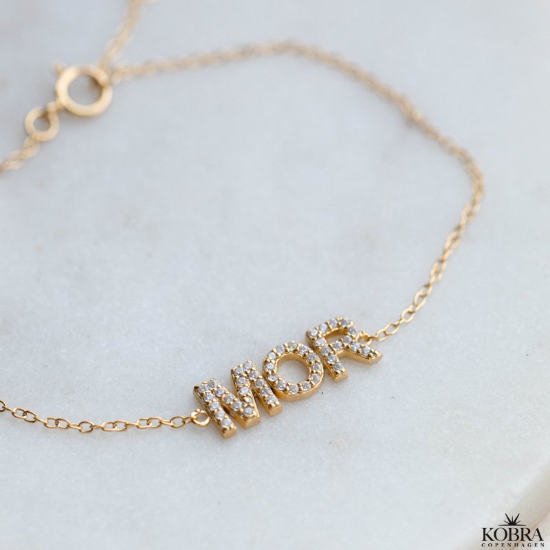 "MOR" guld armbnd med sten
