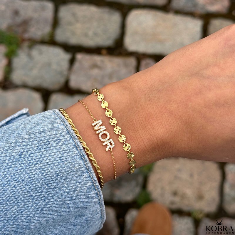 "SOL" guld armbnd med sm guld sole
