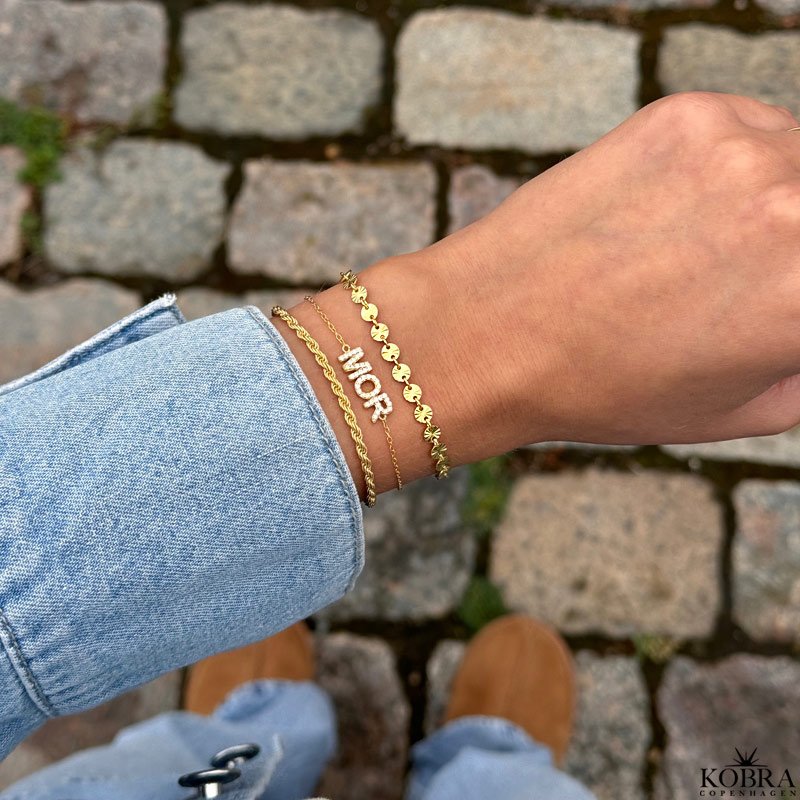 "SOL" guld armbnd med sm guld sole