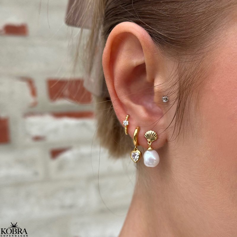 "Junie" heart hoops in gold with white stones