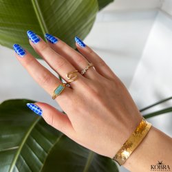 "Naia" blget ring i guld