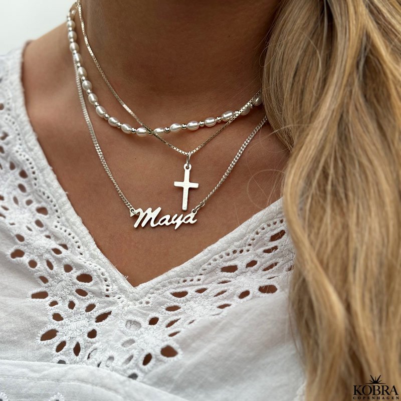 "Sankta" enkel kors halskde i slv