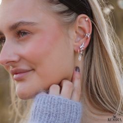 "Lyra" sm slv reringe med hvide glassten