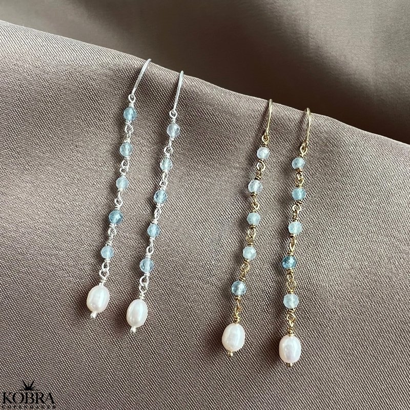 "Ellish" slv retrde med bl aquamariner samt hvid ferskvandsperle