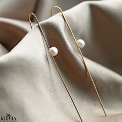 "Cena" respyd i guld med ferskvandsperler