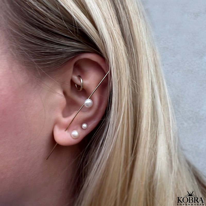 "Cena" respyd i guld med ferskvandsperler