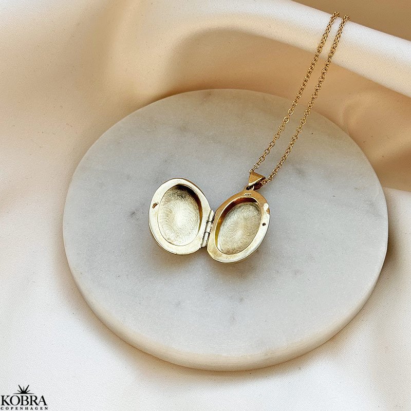 "Ophelia" Gold locket with ornament 