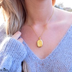 "Ophelia" Gold locket with ornament 