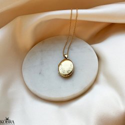 "Ophelia" Gold locket with ornament 
