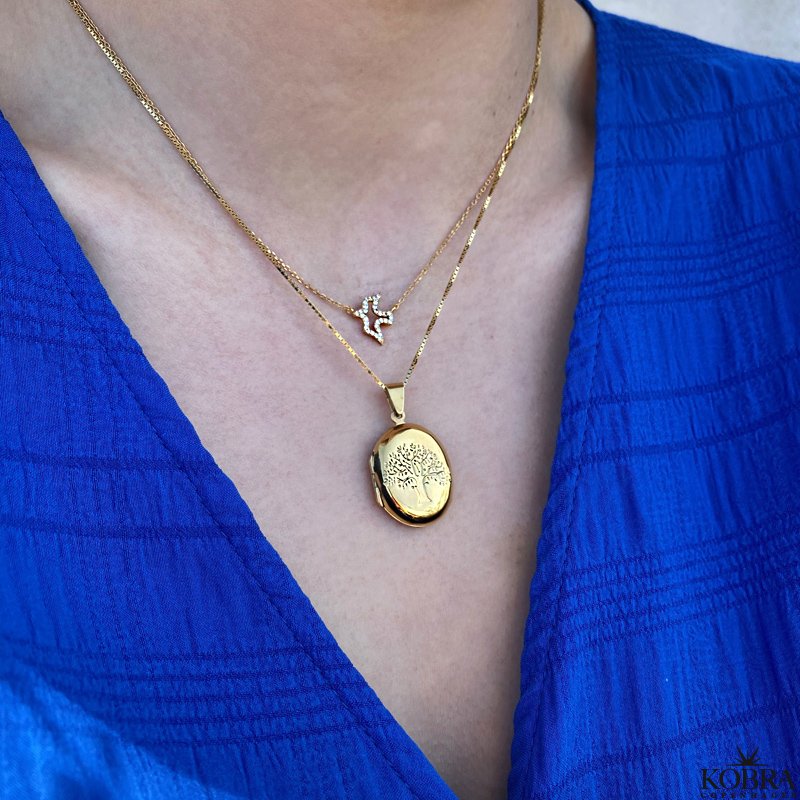 "Berthe" oval guld medaljon med livets tr 