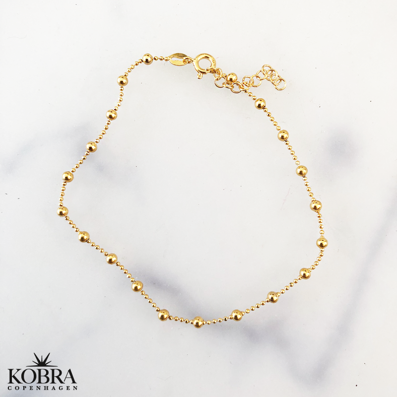 "Ellie" guld ankelkde med guldkugler