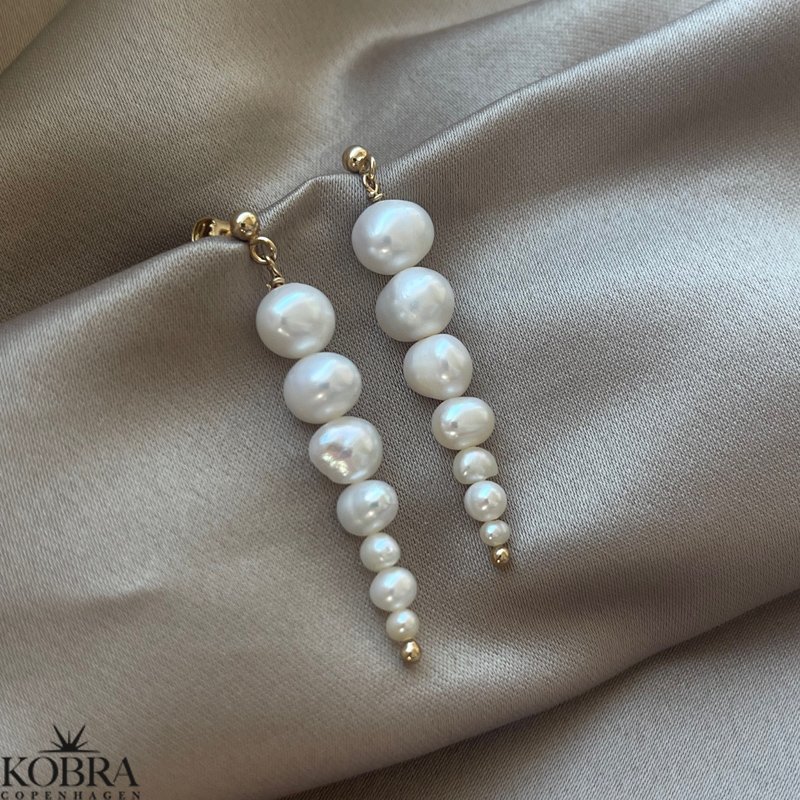 "Paloma" 18 karat forgyldte reringe med gte ferskvandsperler