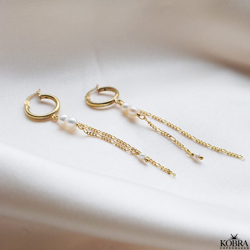 "Balance" gold earrings with white freshwater pearls