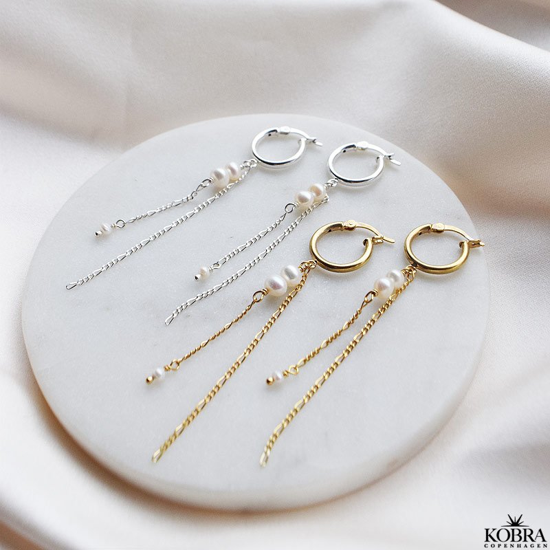 "Balance" gold earrings with white freshwater pearls