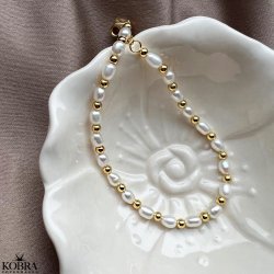 "Royal" perle armbnd med guld kugler