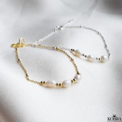 "Amabel" guld armbnd med ferskvandsperler