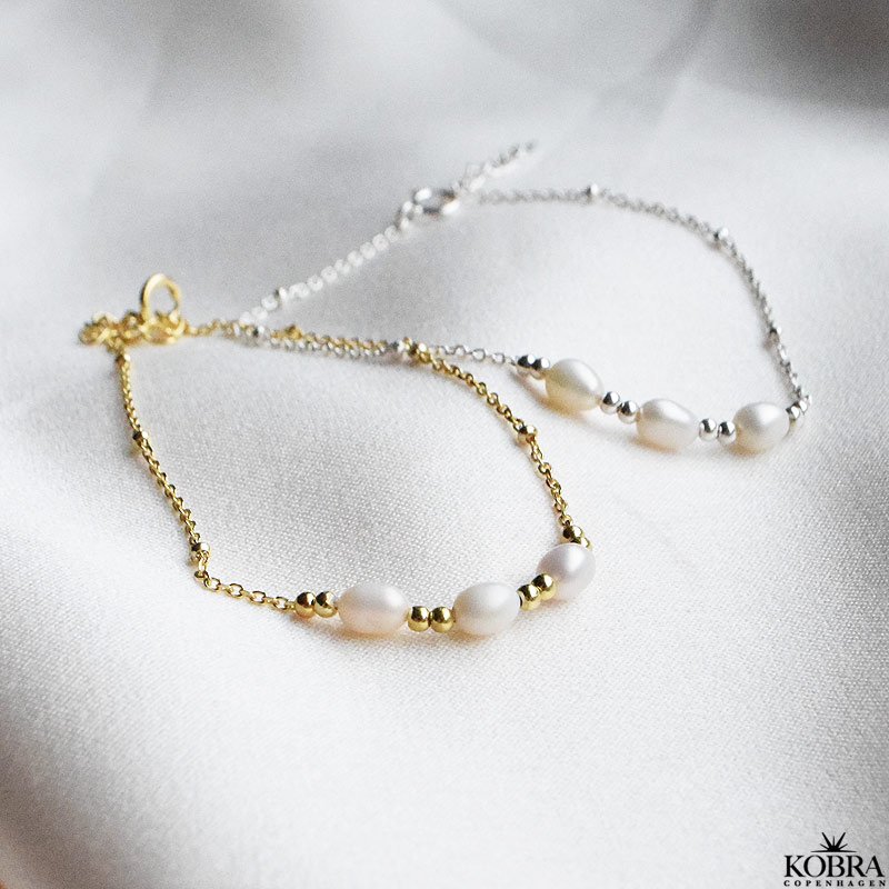 "Amabel" guld armbnd med ferskvandsperler