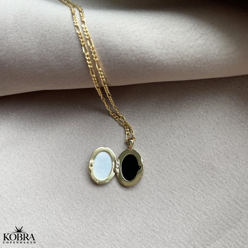 "Spirit" guld medaljon med perlemor