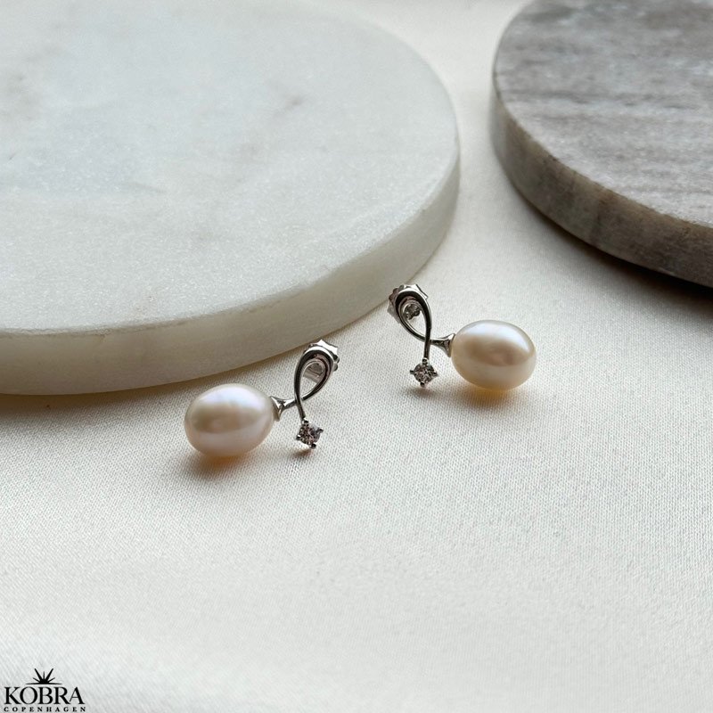 "Antonia" slv reringe med gte ferskvandsperler og fin zirkonia