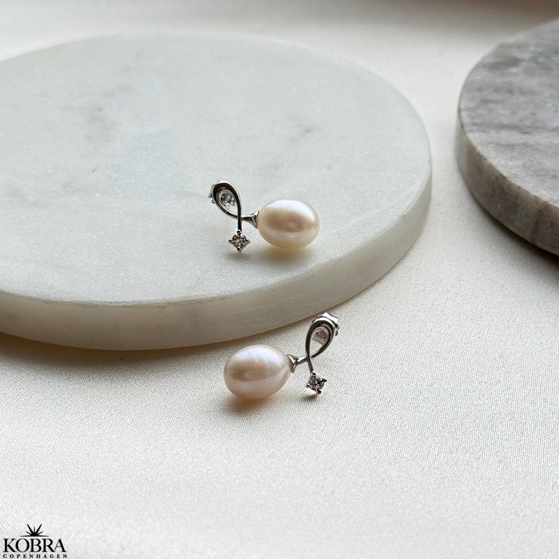 "Antonia" slv reringe med gte ferskvandsperler og fin zirkonia