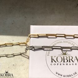 "Quinn" kde i slv eller guld