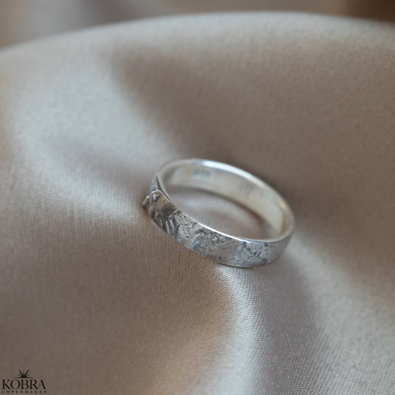 "Ramona" raw silver ring with beaten appearance