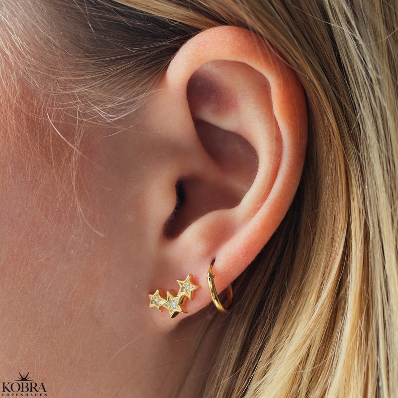 "Reeva" stjernereringe med sten i guld