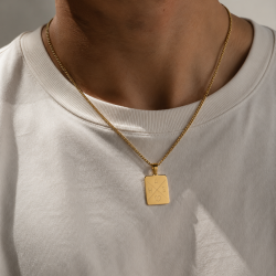 "Reign" necklace in 18K gold-plated stainless steel with cross engraving