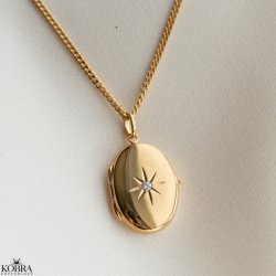 "Rocket" oval guld medaljon med smuk hvid sten