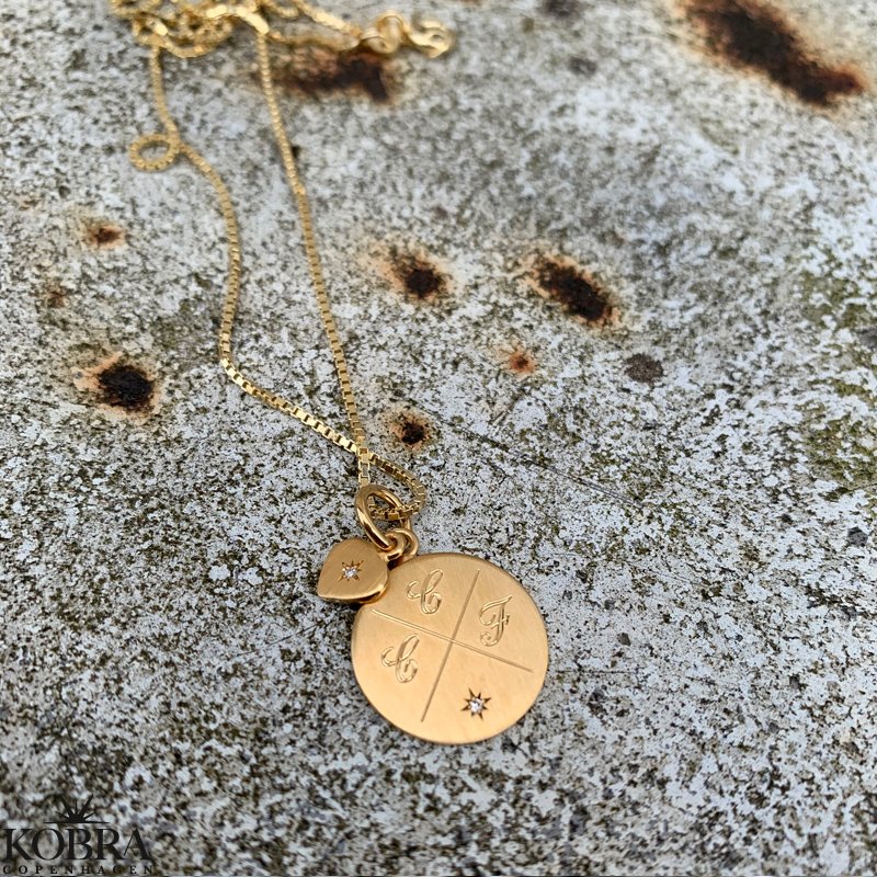 Round "Rocket" cross engraving necklace with stones in gold