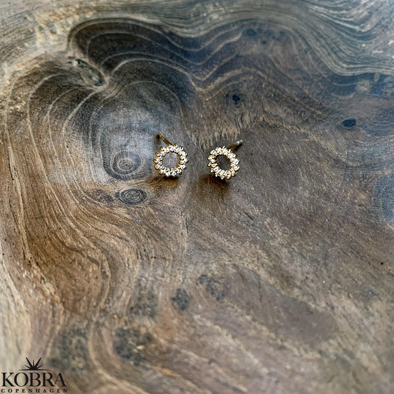 "Ilsa" rund guld reringe med hvide sten