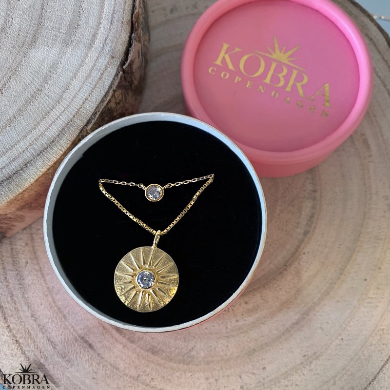 "Torino" gold-plated necklace which symbolizes the sun