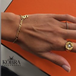 "Rocket" 18 carat gold plated ring with white stone