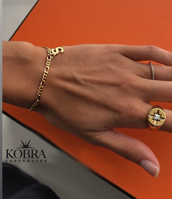 "Rocket" 18 carat gold plated ring with white stone