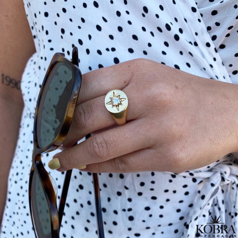 "Rocket" 18 carat gold plated ring with white stone
