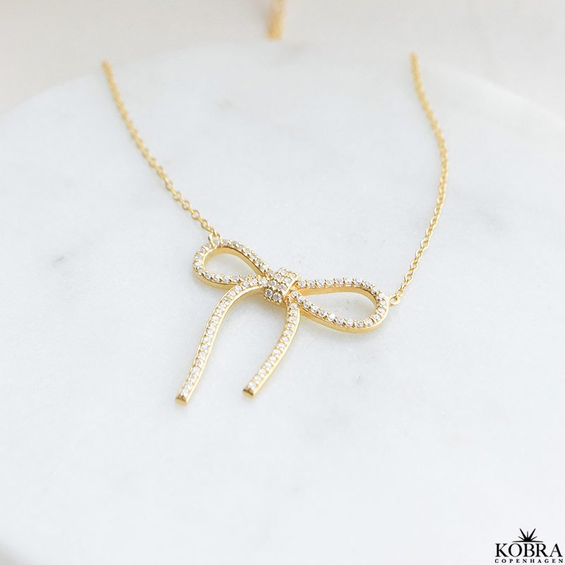 "Leonora" 18k gold plated bow necklace with stones