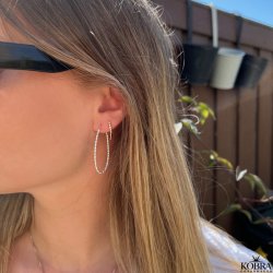 "Sally" large oval twisted silver hoops