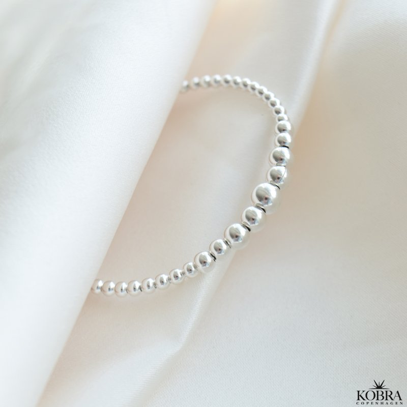 "Mella" slv armbnd / cuff med slv kugler