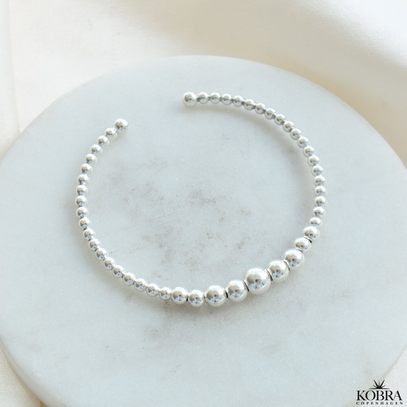 "Mella" slv armbnd / cuff med slv kugler