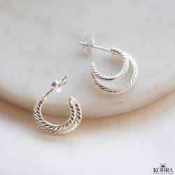 "Cecilie" silver stud earrings with textured rings