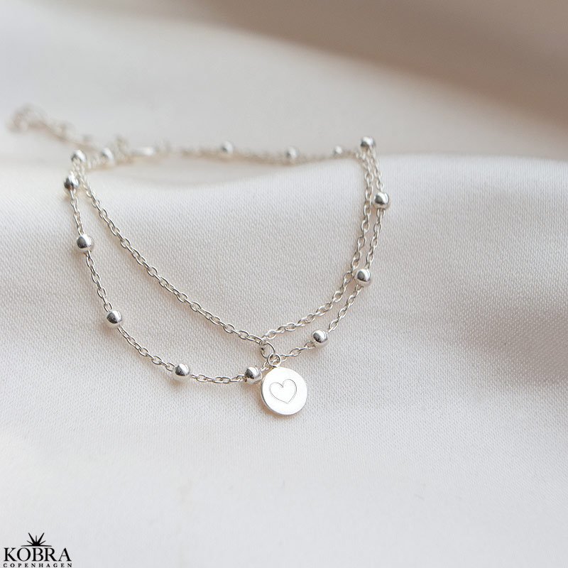 "Ellie" 2i1 silver bracelet with small amulet