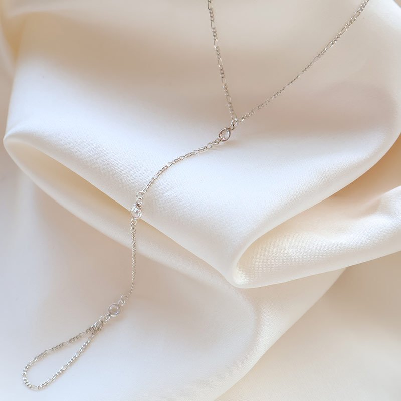 "Alessia" sterling silver hand chain with white zirconia