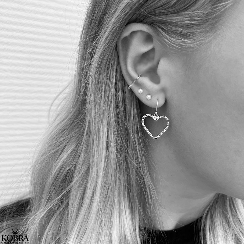 "Adore You" heart earrings in silver with a beaten surface