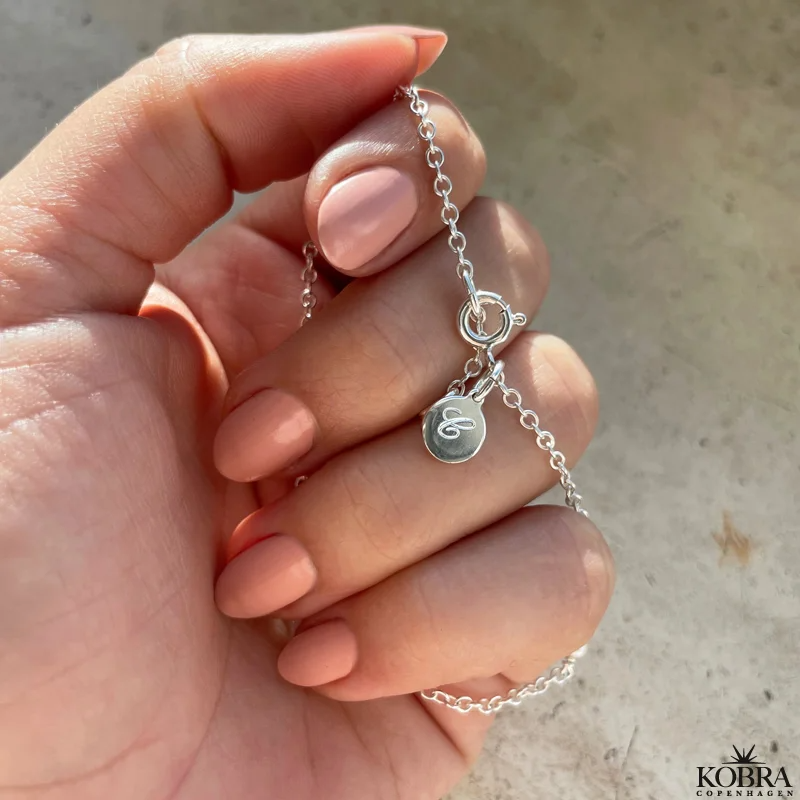 Konfirmationssmykke "Trust" mini kors armbnd i slv